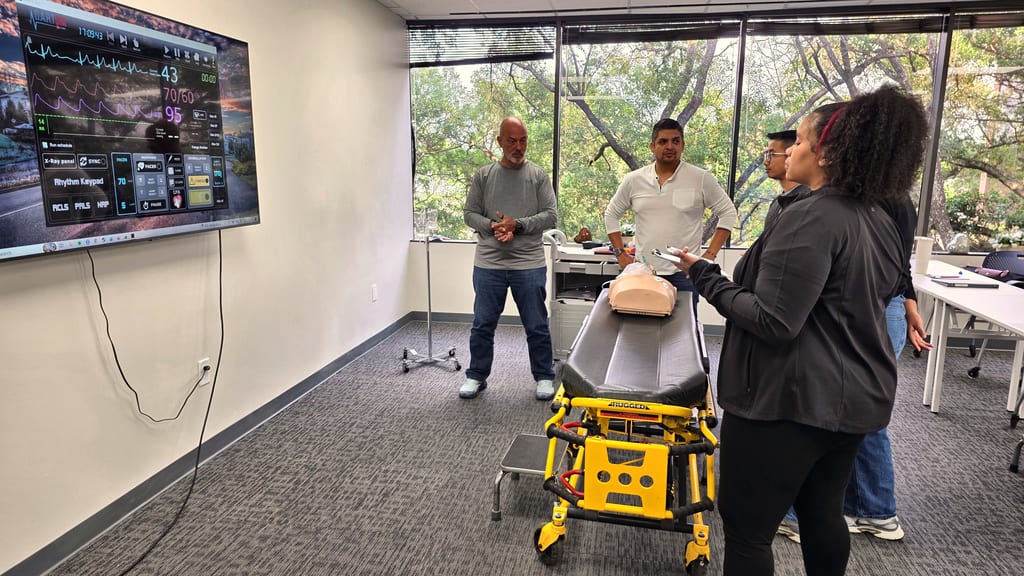 Students completing an ACLS megacode checkoff during advanced cardiac life support training
